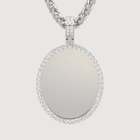 A 14k gold oval picture pendant with a diamond border hangs from a matching chain against a plain light background.