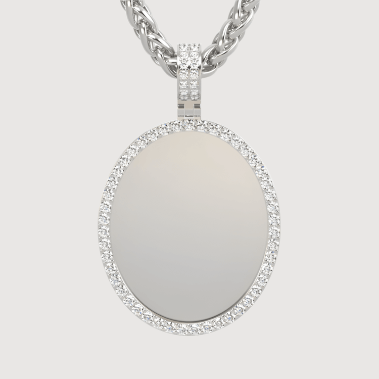 A 14k gold oval picture pendant with a diamond border hangs from a matching chain against a plain light background.