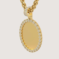 The 14K Gold Scalloped Oval Diamond Photo Pendant features an elegant oval centerpiece framed with diamonds, beautifully displayed on a twisted gold chain.