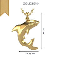 The 14k Gold Shark Pendant, measuring 25mm tall by 23.15mm wide, is shown on a white background with GOLDZENN branding. This shark-shaped jewelry piece comes on a chain and is ideal for anyone who loves unique gold accessories.