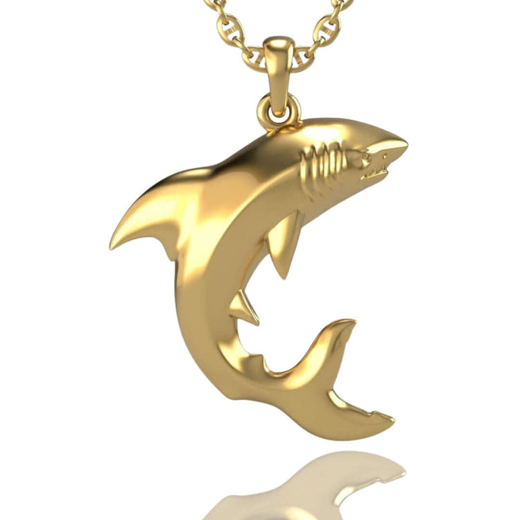 The 14k Gold Shark Pendant features a detailed shark design with defined fins, gills, and teeth on a matching chain—perfect for anyone seeking bold and unique shark jewelry.