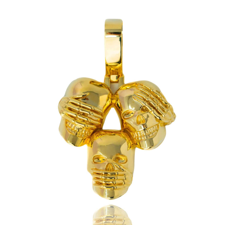 The Hear No Evil, See No Evil, Speak No Evil Gold Pendant features three polished 14K gold skulls inspired by Japanese philosophy, symbolizing see no evil, hear no evil, and speak no evil.
