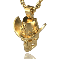 The 14k Gold Skull Sheriff Pendant features a skull in a cowboy hat with a star and chain detail on a matching gold chain, shown against a white background. A bold men's gold necklace or unique sheriff pendant.