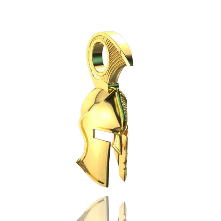 The 14k Gold Heroic Spartan Helmet Pendant is displayed on a white background with a subtle reflection below, showcasing its detailed crest and angular faceguard that embody the bold spirit of ancient warriors.