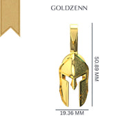 The 14k Gold Heroic Spartan Helmet Pendant showcases a helmet-shaped gold design with a top loop, measuring 50.89 mm tall by 19.36 mm wide. The word GOLDZENN is displayed above this striking pendant on a white background.