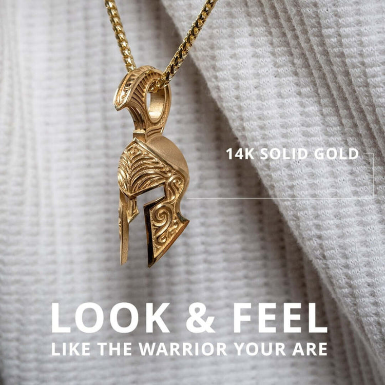 The Spartan Helmet Pendant - 14k Solid Gold is a striking gold necklace featuring a bold Spartan helmet charm on a delicate chain, ideal for fans of distinctive Spartan jewelry.