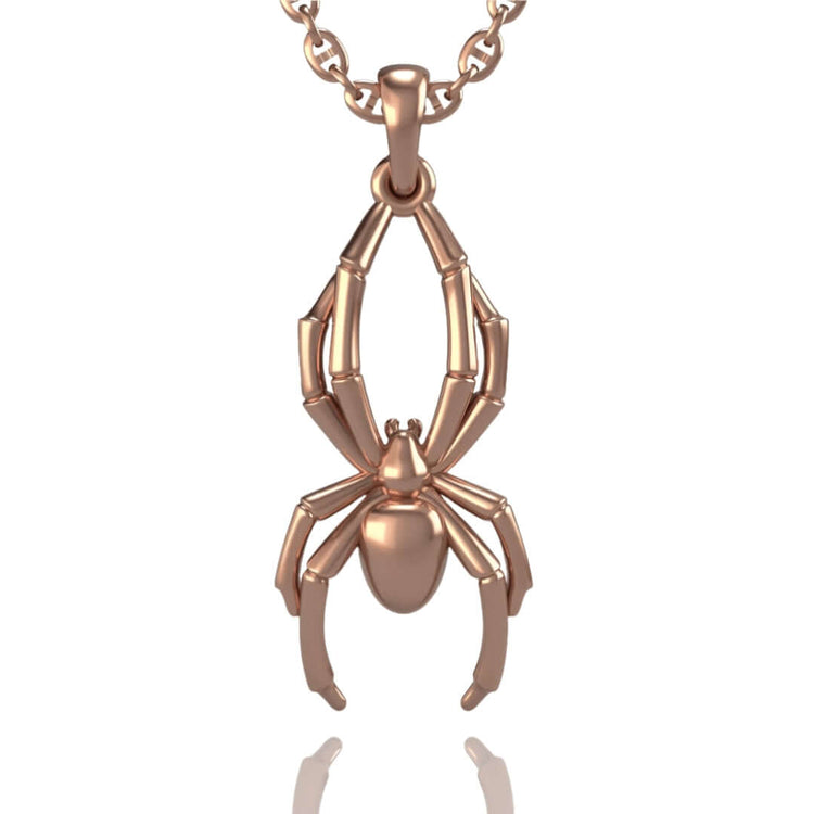 The 14k Gold Spider Pendant showcases a stylized spider with detailed legs and body, elegantly hanging from a chain—an eye-catching piece of spider jewelry.