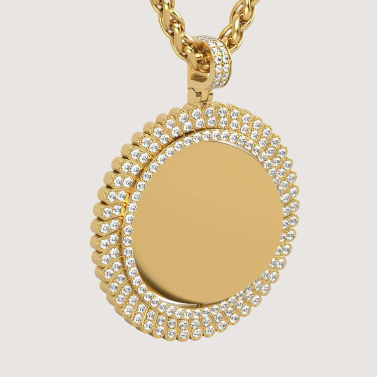 The 14K Gold Sunburst Diamond Round Picture Pendant features a textured, beaded edge, two rows of white diamonds, and a smooth center, all suspended from a thick gold rope chain for an elegant finish.
