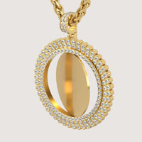 The 14K Gold Sunburst Diamond Round Picture Pendant features a circular, hollow design accented by two rows of sparkling diamonds and hangs from an elegant twisted gold chain.