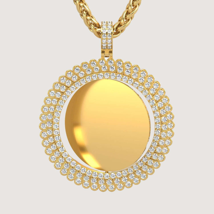 The 14K Gold Sunburst Diamond Round Picture Pendant features a blank, polished center encircled by two rows of sparkling diamonds, hanging on a twisted gold chain against a plain light background.