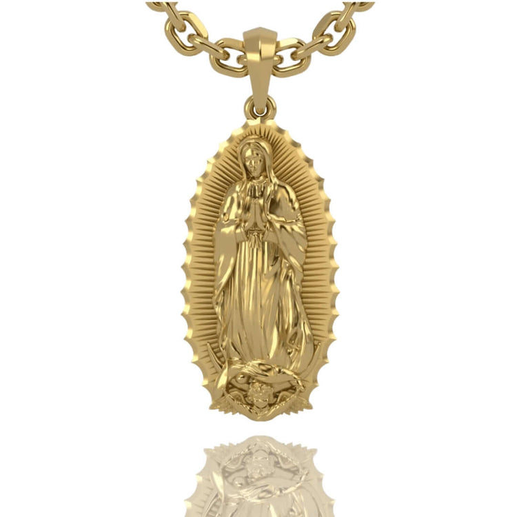The 14k Gold Virgen de Guadalupe Pendant features a detailed Virgin Mary with folded hands, framed by radiant scalloped edges and attached to a sturdy gold chain—a timeless piece of faith jewelry.