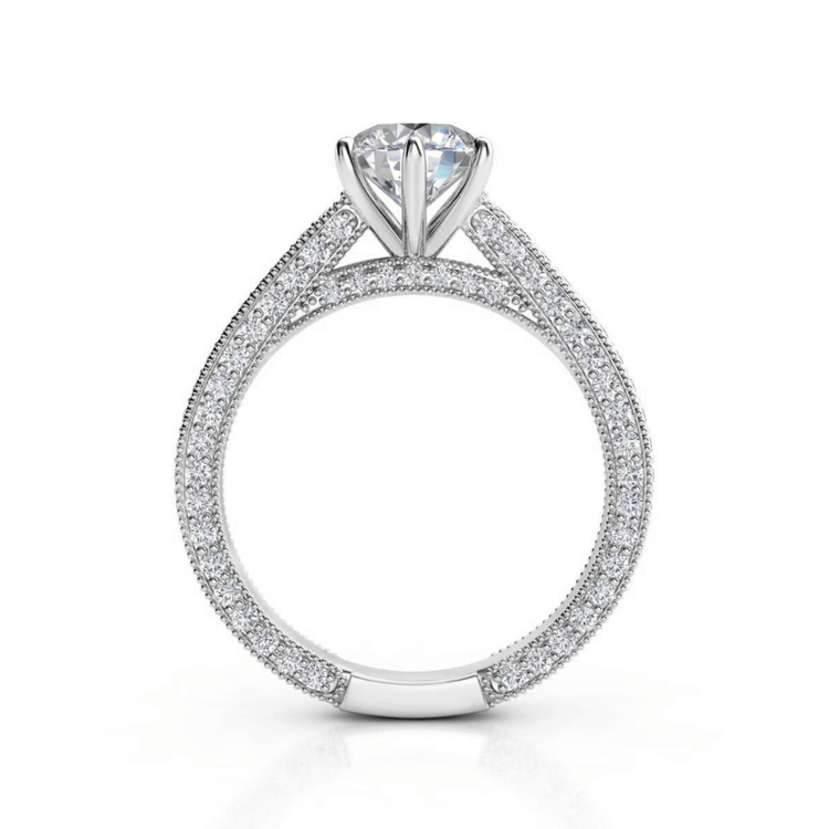 The 14k Round Lab Diamond Engagement Ring - Prong Setting features a round solitaire lab diamond with pavé-set diamonds along the band and profile, adding extra sparkle—an elegant women’s engagement ring.