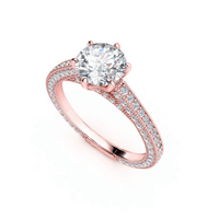 The 14k Round Lab Diamond Engagement Ring features a prong-set center and pavé diamonds along a split shank band, shown on a white background.
