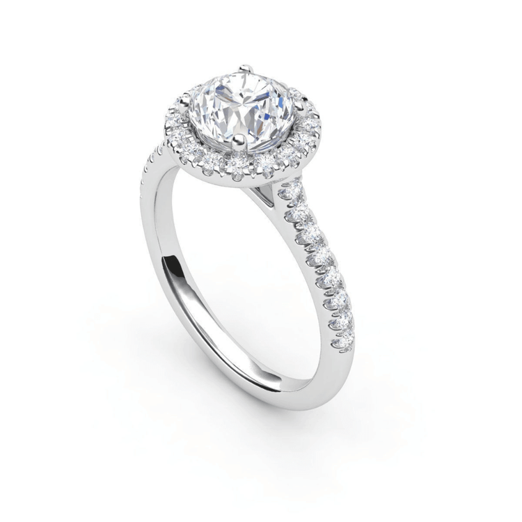 The 14k Round Lab Diamond Halo Setting Engagement Ring showcases a large round lab diamond center in a brilliant halo setting, with additional stones surrounding the center and lining the band.