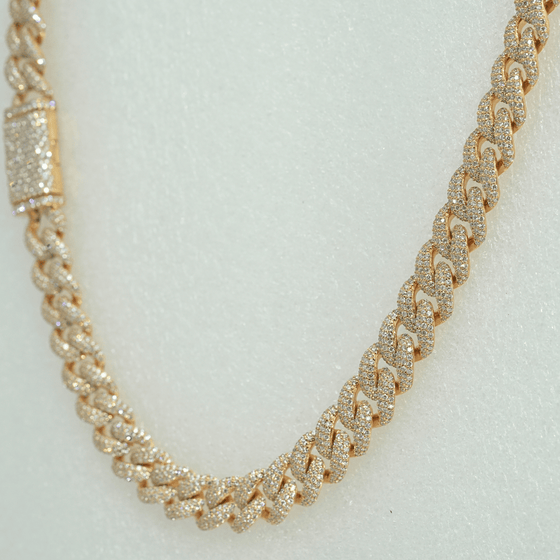 11mm iced-out Cuban link chain with 21ct lab-grown diamonds and 10k gold, 22-inch length, luxury men's jewelry necklace.