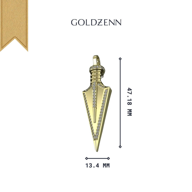 The 14k Gold Arrow Pendant features a pointed spear design with a row of small diamonds along the sides, measures 47.18 mm long by 13.4 mm wide, and showcases the GOLDZENN logo above the minimalist gold piece.