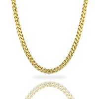The Franco Chain - 3mm-3.5mm 14k Gold Bonded is displayed on a white background with a subtle reflection, perfect for those seeking a bold, polished look similar to classic curb link gold chains.