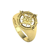 The 14k Gold Compass Ring features a raised compass rose with intricate details and pointed edges, inspired by nautical star navigators—an eye-catching gold men's ring.