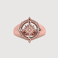 The 14k Gold Compass Ring - Nautical Star Navigator Design features a detailed compass with N, S, E, and W in rose gold—a stylish gold ring for men or the perfect nautical gift.