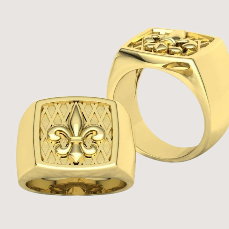 Two 14k Gold Fleur-de-Lis Signet Rings with square faces feature an embossed fleur-de-lis on a diamond-patterned background, shown from the front and side.