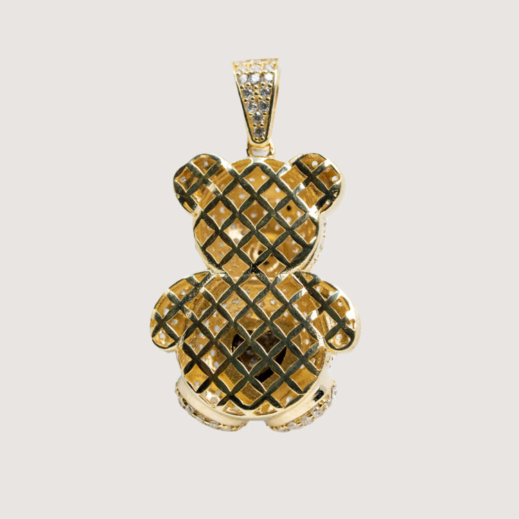 The 14k Yellow Gold Teddy Bear Pendant features a lattice design and clear stones on its bail, ears, and feet. Set in polished yellow gold, it's a charming piece to enhance any gold jewelry collection.