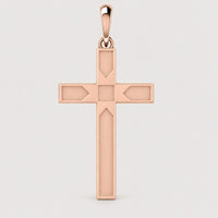 The 14k Gold Beveled Cross Pendant in rose gold features geometric detailing and a beveled design, displayed against a plain warm off-white studio background.