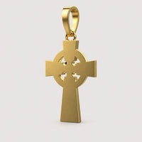 The 14k Gold Celtic Cross Pendant features a circular ring connecting its arms and a loop at the top for a chain, shown against a plain warm off-white studio background.
