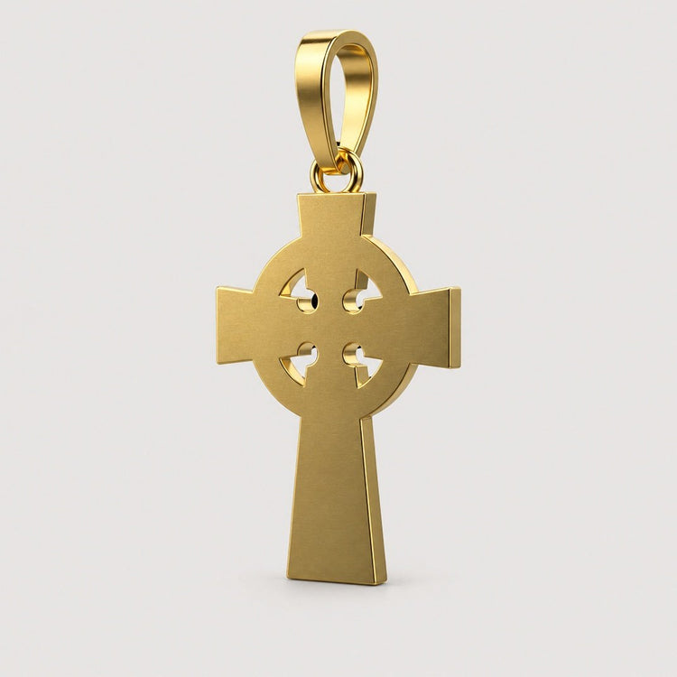 The 14k Gold Celtic Cross Pendant features a circular ring connecting its arms and a loop at the top for a chain, shown against a plain warm off-white studio background.