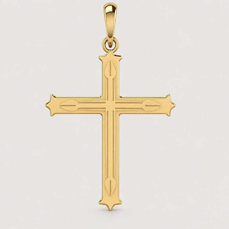 The 14k Gold Decorative Cross Pendant features subtle engraved lines and pointed tips, showcased against a plain light background.