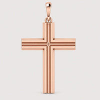 A 14k Gold Layered Cross Pendant featuring beveled edges and a smooth finish, displayed against a plain light gray background.