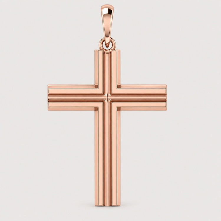 A 14k Gold Layered Cross Pendant featuring beveled edges and a smooth finish, displayed against a plain light gray background.