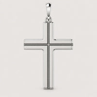 Showcasing minimalist gold jewelry elegance, the 14k Gold Sleek Cross Pendant features a polished finish and thin border, beautifully presented against a plain light background.