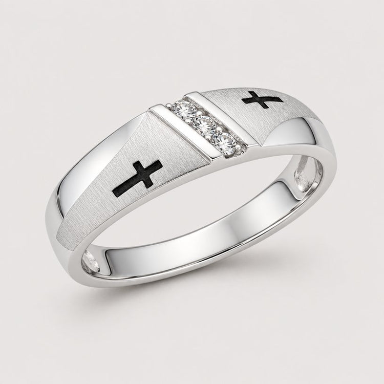 The 10k Gold Diamond Cross Wedding Band 1/20 Cttw features a single row of diamonds with two small black cross designs on each side, highlighting three clear center stones.