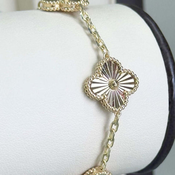 Gold Four Leaf Clover Bracelet - 14k Yellow Gold Radiant 14k yellow gold four leaf clover necklace. Add a touch of timeless elegance and good fortune to your style. Shop now and bring luck!