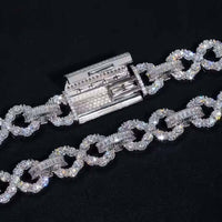 A close-up of the Silver Moissanite Infinity Necklace - 16mm, featuring sparkling moissanite stones set in 925 sterling silver, displayed on a black background with its clasp open and visible.