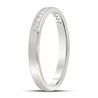 The 14k White Gold Channel-Set Diamond Wedding Band 1/10 Cttw features a slim, polished white gold band with a single row of round diamonds in a linear channel setting, displayed on a plain white background.