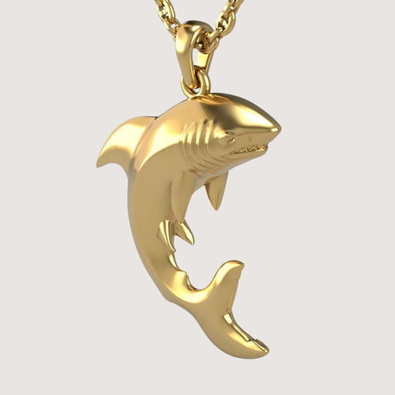 14k Gold Shark PendantDiscover the 14K Gold Shark Pendant. A bold and dynamic men’s gold pendant crafted from 14K solid gold, showcasing a sleek shark design with radiant polish.