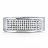 The 10k White Gold Round Diamond Micropave Wedding Band showcases a polished band with a rectangular, grid-like section adorned with rows of sparkling round diamonds for a dazzling effect.