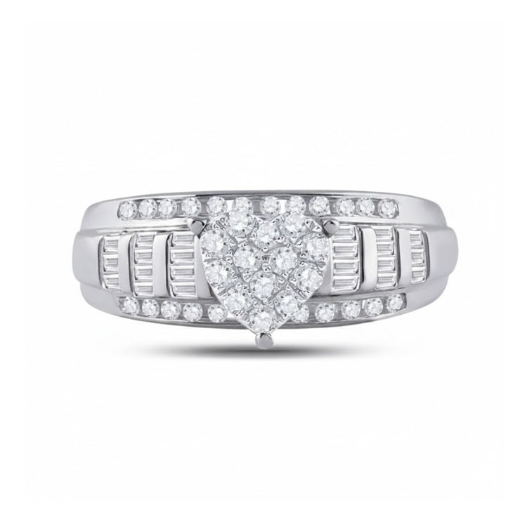 The 10k Gold Round Diamond Heart Engagement Ring features a dazzling heart-shaped cluster of round diamonds on a gold band, framed by additional sparkling stones—an elegant and romantic choice for a bridal ring.