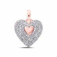 The 10k Gold Diamond Heart Pendant 1/4 Cttw features a rose gold center, concentric rows of sparkling white stones, and a rose gold bail, beautifully crafted in Nicole’s Dream Collection.