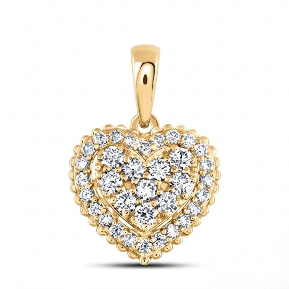 The 1/2 CTW Diamond Heart Pendant in 14K Gold dazzles with sparkling white diamonds, a decorative scalloped border, and a gold bail—an elegant choice to enhance any necklace.