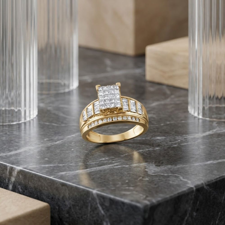 A 10k Gold Princess Diamond Bridal Engagement Ring 1 Cttw is displayed on a dark marble surface, surrounded by textured glass columns and beige stone blocks. This elegant bridal engagement ring features multiple rows of sparkling diamonds and a stunning princess diamond cluster that beautifully catches the light.