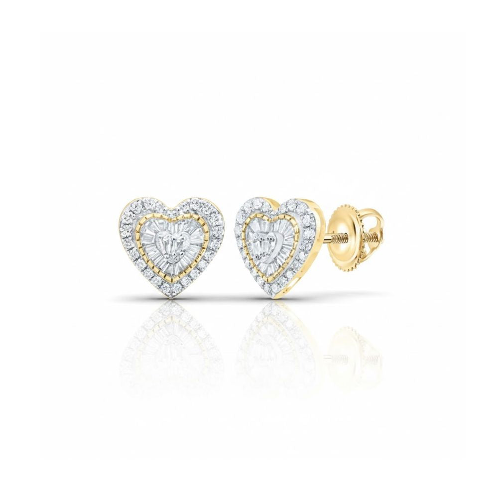 The 3/8CTW Natural Diamond Heart Baguette Earrings in 10k gold feature heart-shaped studs with central diamond clusters and a halo of smaller diamonds, displayed on a white background.