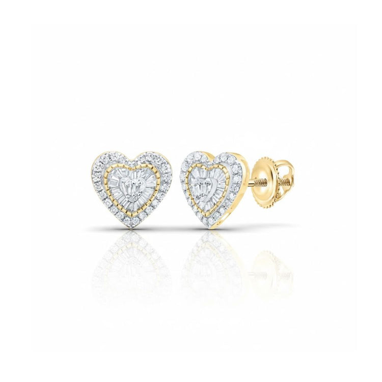 The 3/8CTW Natural Diamond Heart Baguette Earrings in 10k gold feature heart-shaped studs with central diamond clusters and a halo of smaller diamonds, displayed on a white background.