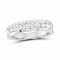 The 14k Gold Round Diamond Single Row Wedding Band 1 3/4 Cttw features a channel-set row of sparkling round diamonds, elegantly displayed on a plain white background.