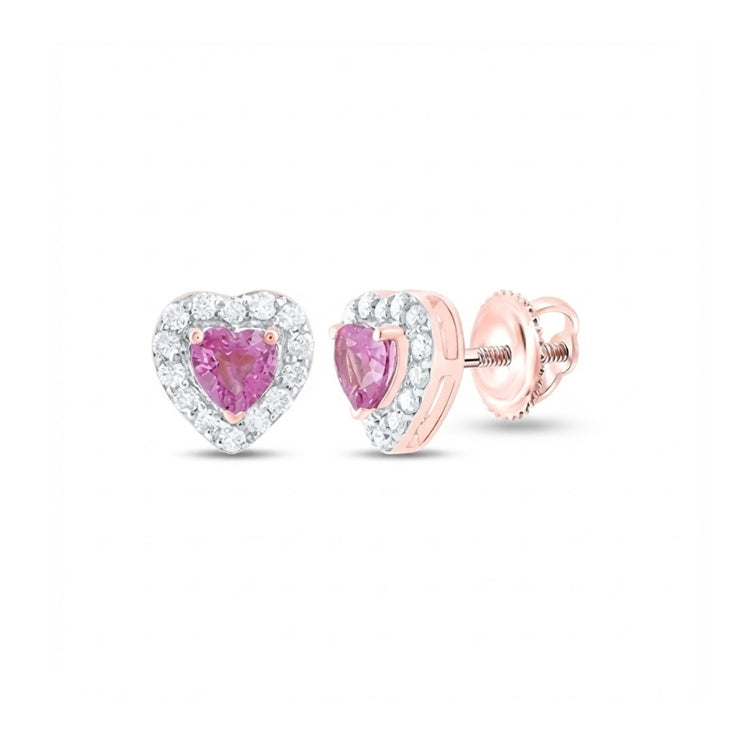 These 1/10CT heart earrings feature pink sapphires surrounded by a halo of white diamonds and are set in 14K rose gold with secure screw-back posts.