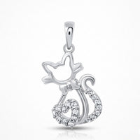The 1/10 CTW Diamond Heart Cat Pendant in 10K Gold is perfect for cat lovers, featuring a gold cat outline with a heart-shaped, diamond-accented tail tip, shown on a plain white background.