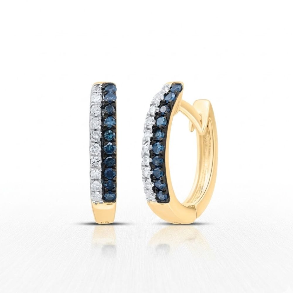 The 10K Blue Diamond Huggie Earrings 1/5 CTTW Gold feature two rows of small round stones—blue diamonds and white stones—set in gold, displayed on a light background.