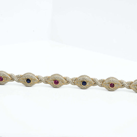 Diamond Evil Eye Gemstone Bracelet - 10k Gold Dazzling 13ct diamond evil eye bracelet in 10k yellow gold. VS clarity natural diamonds for protection & luxurious style. Shop this 8" statement piece!