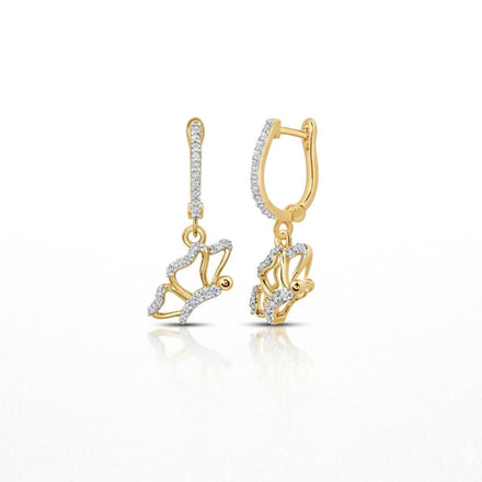The 10k Gold Diamond Butterfly Dangle Earrings 1/4 Cttw feature delicate butterfly-shaped pendants adorned with sparkling diamonds, highlighted against a white background to showcase their elegant and refined design.